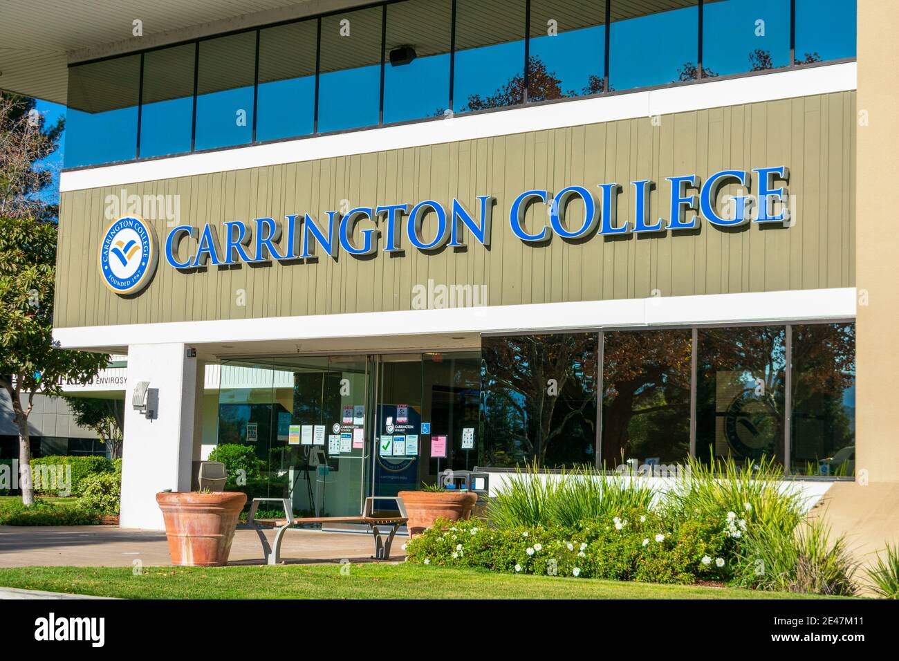 Carrington College sign on the entrance to for profit private college campus - San Jose, California, USA - 2020 Stock Photo