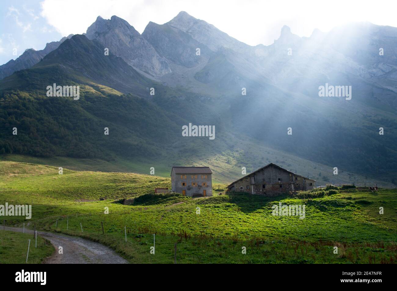 Light ray over  chalets Stock Photo