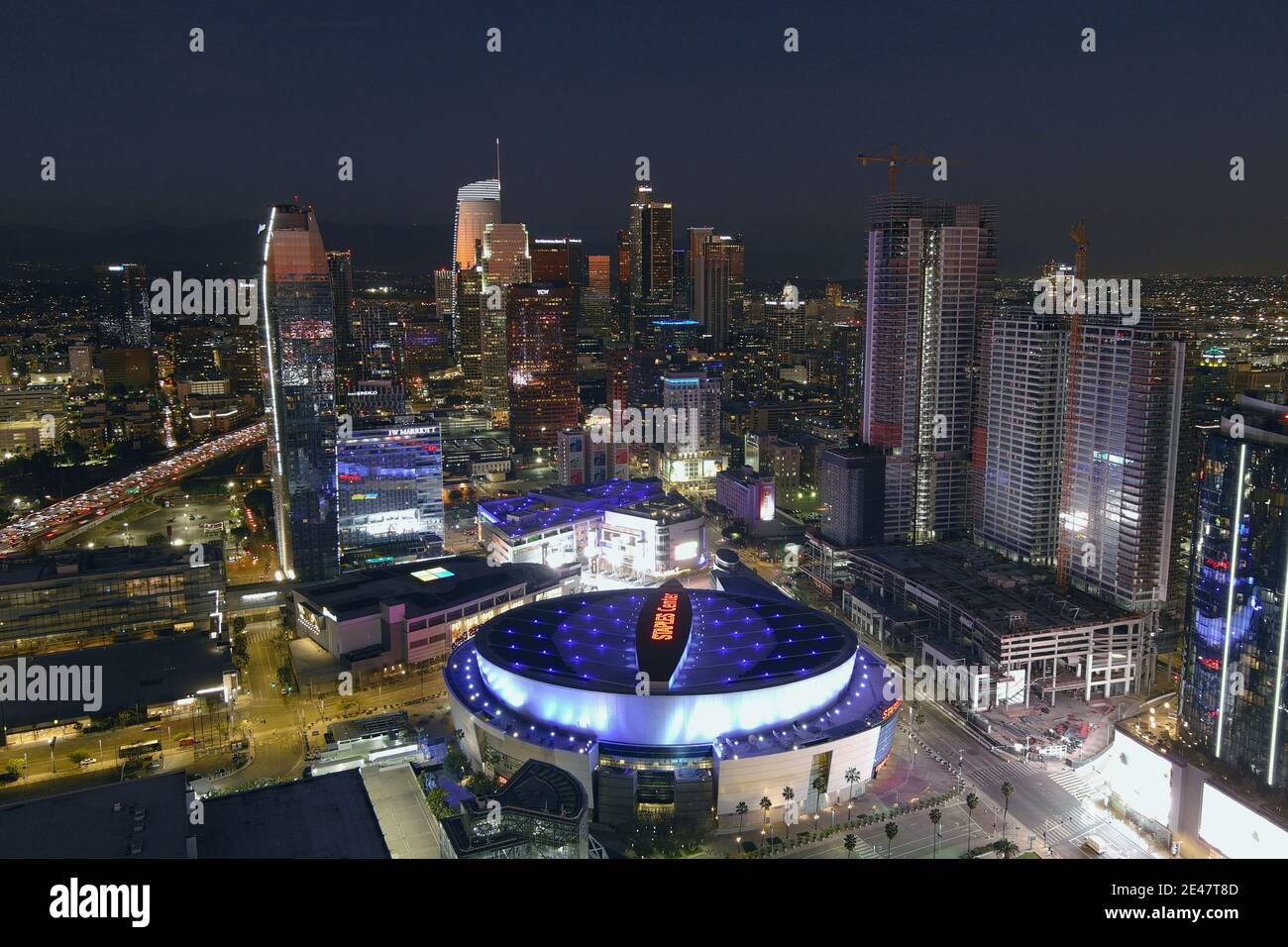 An aerial view of the Staples Center and downtown skyline, Thursday, Jan. 21, 2021, in Los Angeles. The arena is the home of the Los Angeles Lakers an Stock Photo