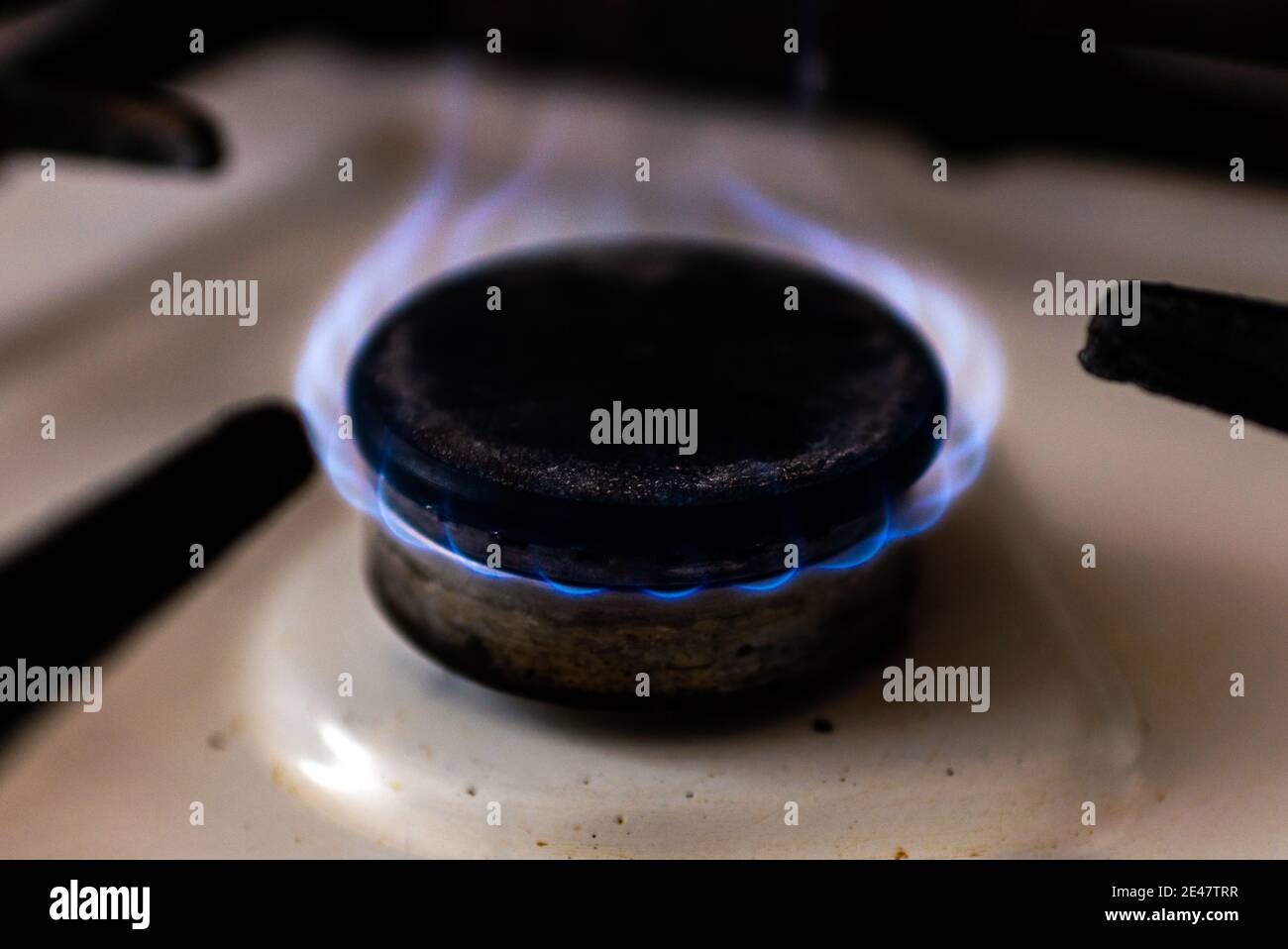 Gas burning kitchen gas stove at home evening Stock Photo Alamy