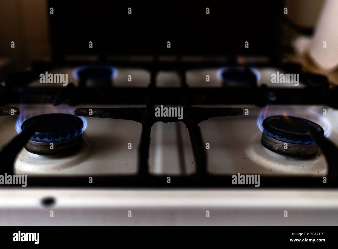 Gas burning kitchen gas stove at home evening Stock Photo Alamy