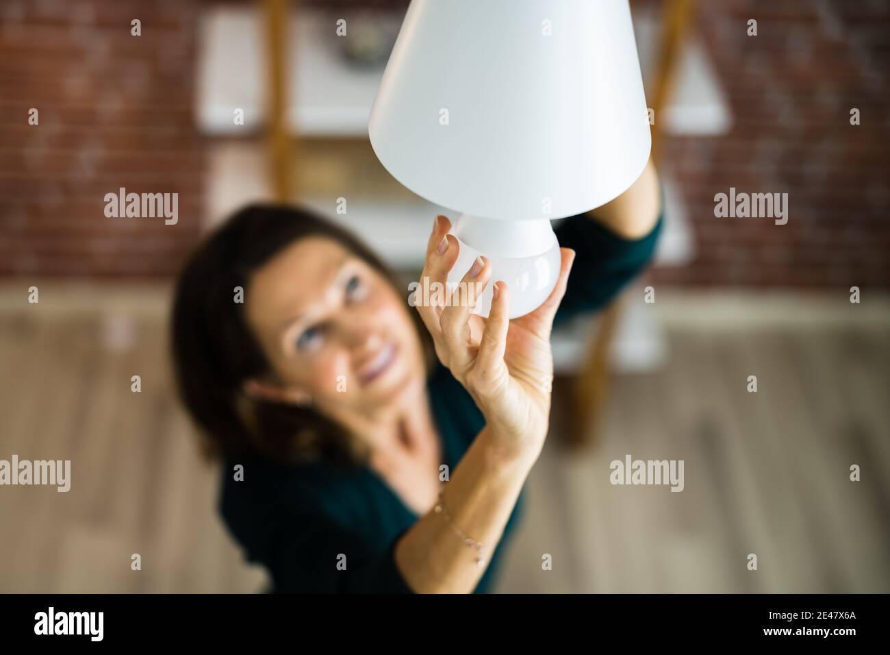 Electric LED Lightbulb Change In Light At Home Stock Photo Alamy