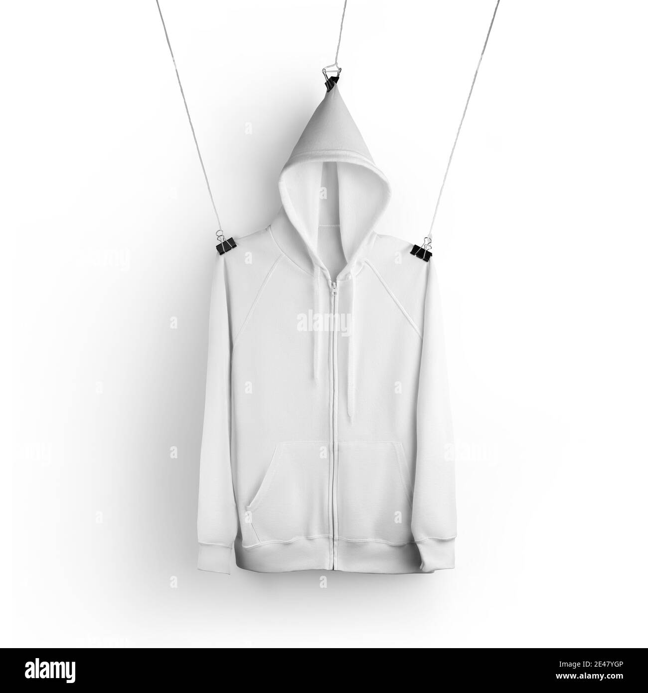 Mockup of a white textured hoodie with a zip fastener, a pocket, hanging on ropes by the hanger, hood, isolated on background. Long sleeve clothing te Stock Photo