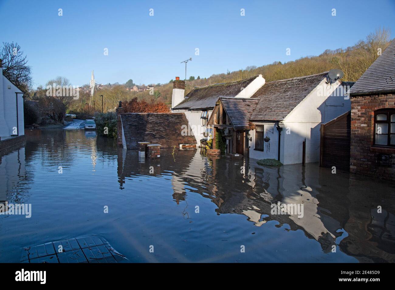 Shropshire, UK. 22nd Jan 2021. The River Severn has burst its banks along the stretch in Shropshire, flooding properties. The village of Jackfield in the Ironbridge Gorge has been particulary badly flooded. 2020 saw the worst floods in 20 years, and residents fear a repeat this winter. Credit: Rob Carter/Alamy Live News Stock Photo