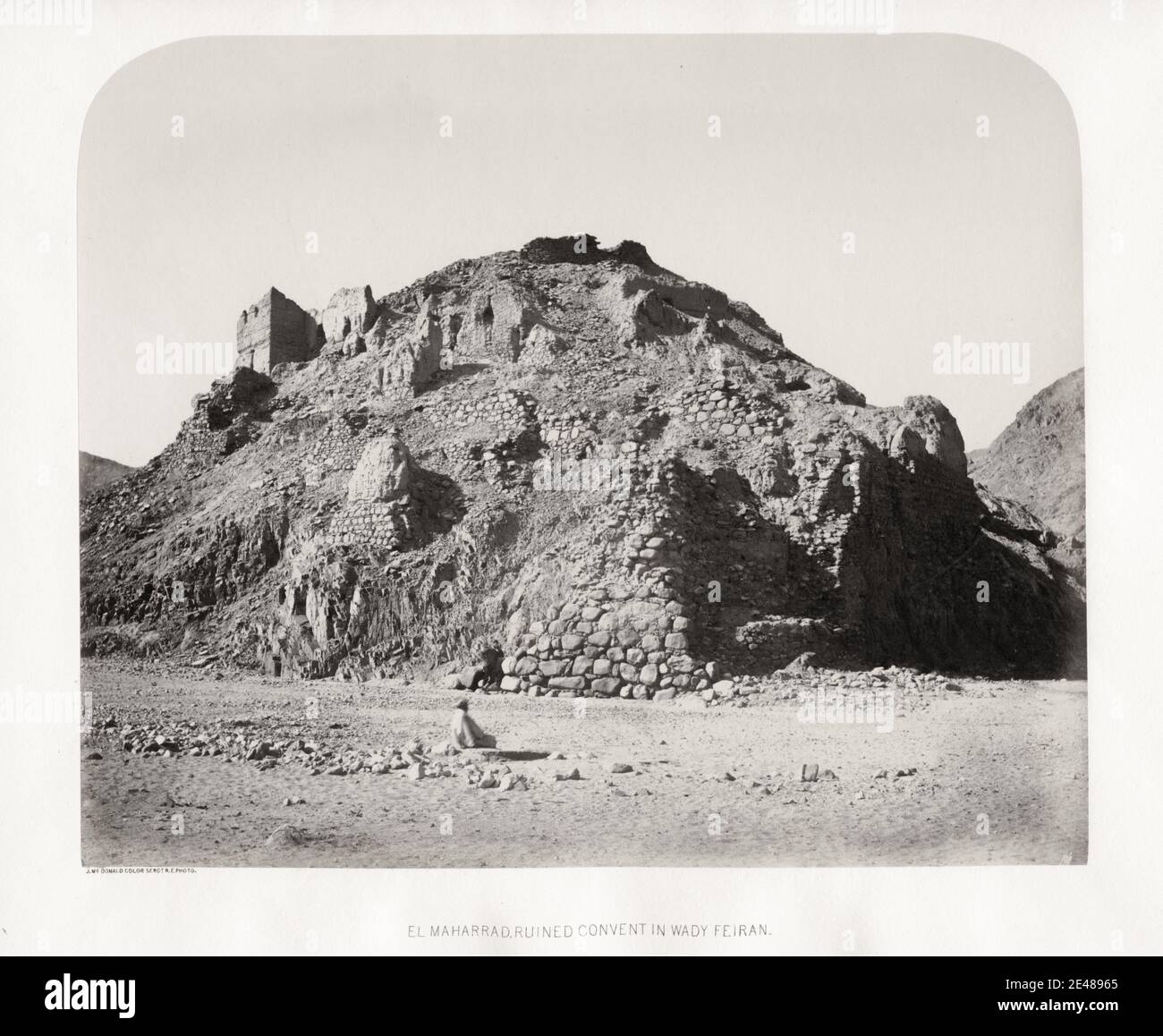 Vintage 19th century photograph: Sergeant James McDonald (active 1865-9). Ordnance survey of the Peninsula of Sinai by the Royal Engineers - Ruined convent, Wady Feiran. Stock Photo