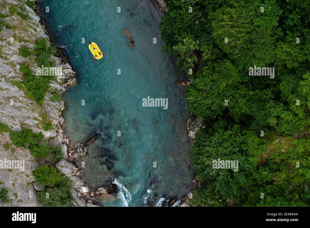 Top view of a kayak in a river captured during the daytime in the ...