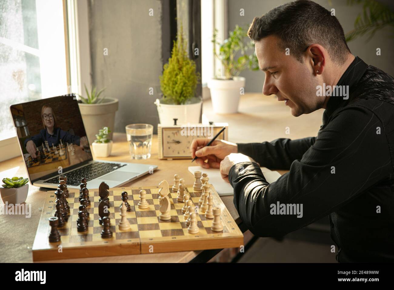 Serious Caucasian Man Chess Player Playing Chess Online With His Student.  Stock Photo, Picture and Royalty Free Image. Image 166757897.