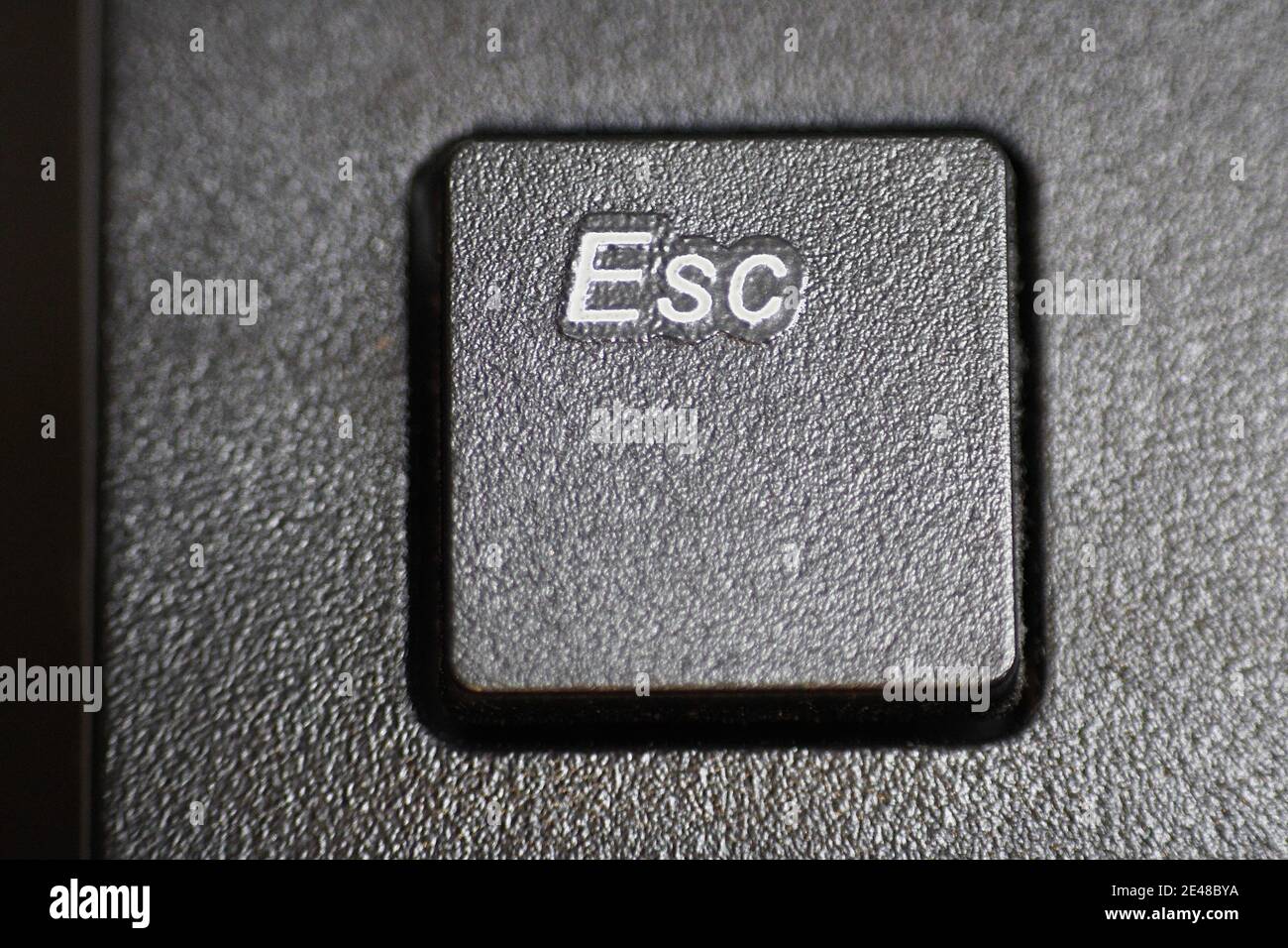 Macro Close up of the Escape Key on a Desktop Computer Keyboard Stock Photo