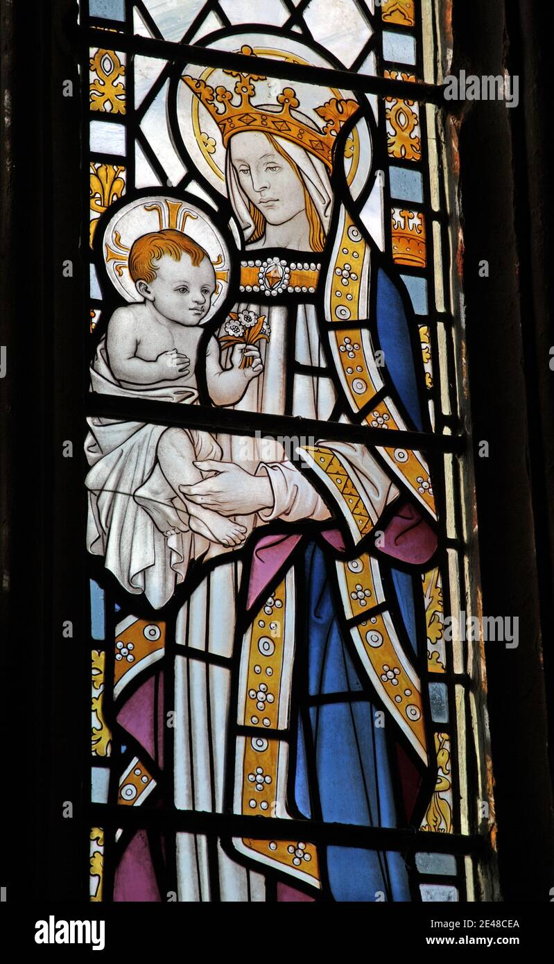 A stained glass window depicting The Madonna and Child, Exford Church, Somerset, England Stock Photo