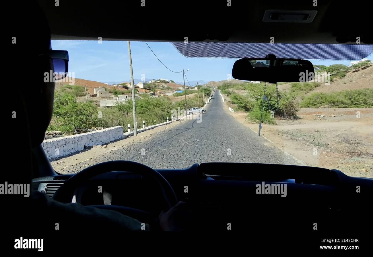 View of car, driving at Cape Verde islands,Sao Vicente, silhouette. Stock Photo