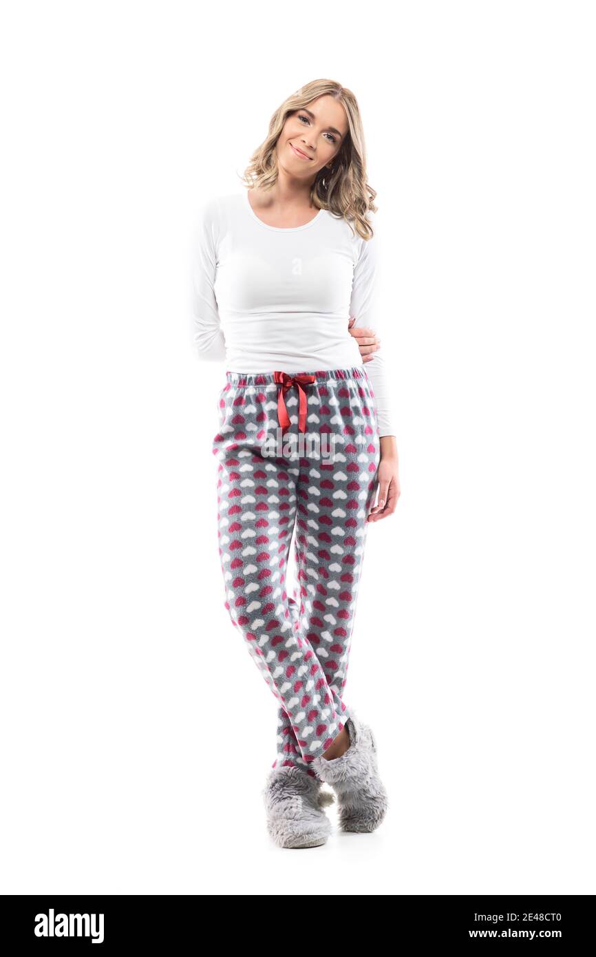 Cute Feminine Young Pretty Female In Cozy Sleepwear Posing Holding Arm Behind Back Full Length Portrait On White Background Stock Photo Alamy