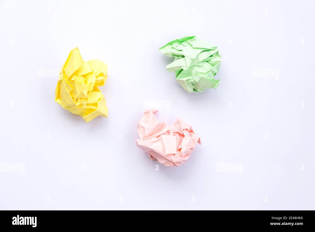 Colorful crumpled paper isolated on white background. Stock Photo