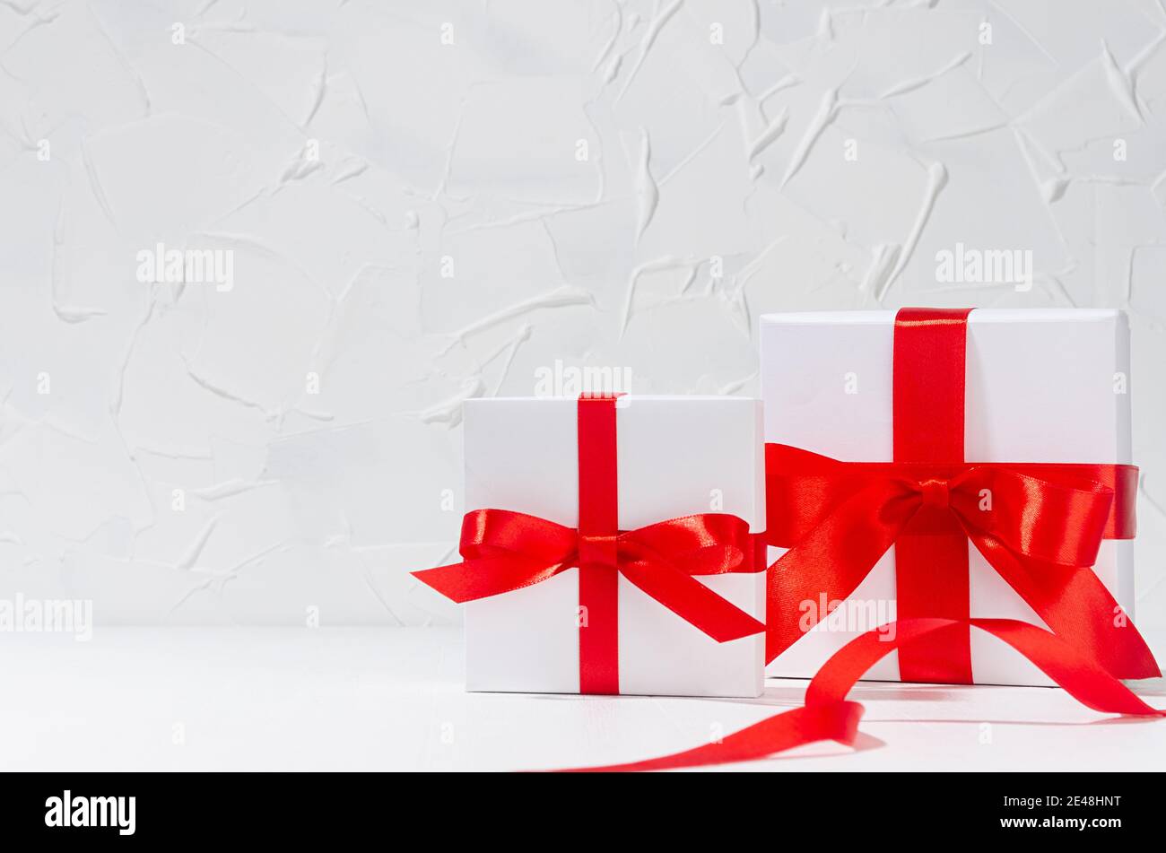 Classic elegant festive congratulation background with white gift boxes