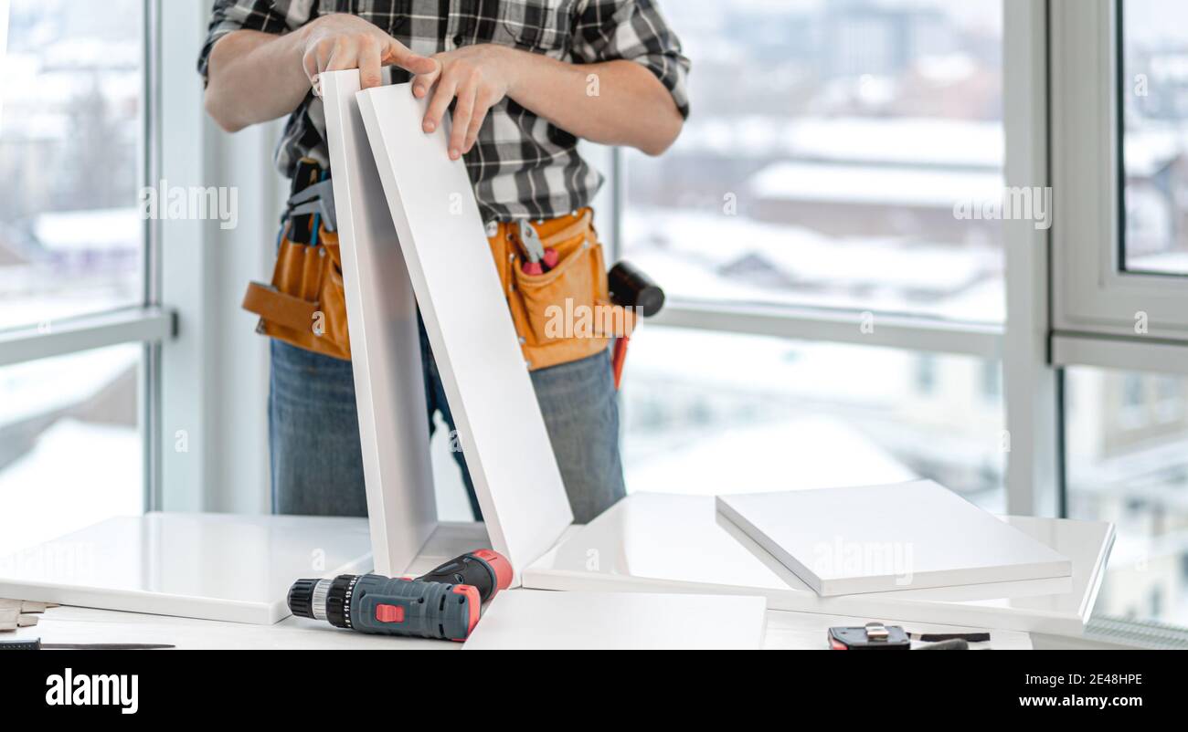 Man working during process of furniture manufacturing Stock Photo Alamy