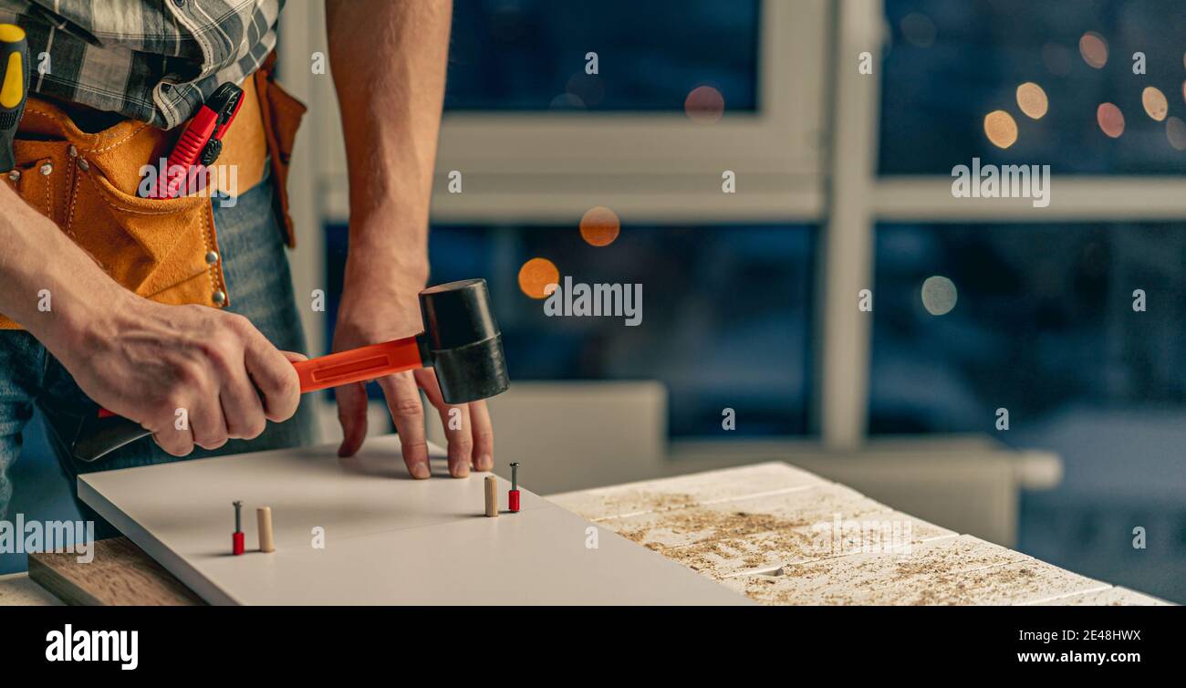 Man working during process of furniture manufacturing Stock Photo Alamy