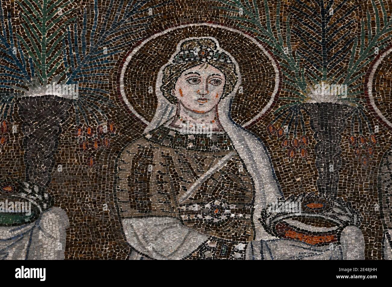 One of the 22 female virgin martyr saints walking eastward in procession  from Classe, Ravenna's ancient seaport, towards the enthroned Madonna and  Child in a Byzantine mosaic of c. 565 AD along