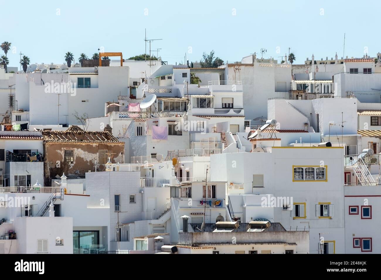 Urban photography of housing neighborhood in highly populated region of Praia dos Pecadores, Albufeira, Portugal. Stock Photo