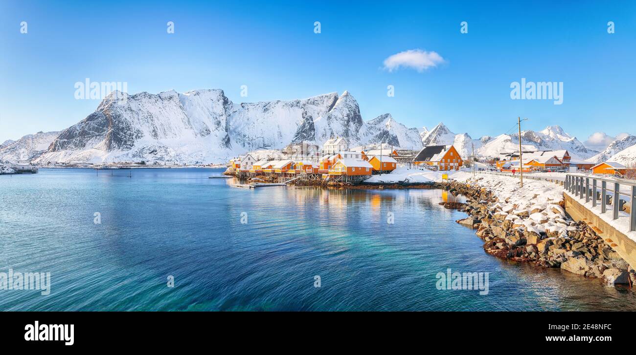 Beathtaking winter view of Sakrisoy village and snowy mountaines on background. Popular tourist destination on Lofotens.   Location: Sakrisoy , Mosken Stock Photo