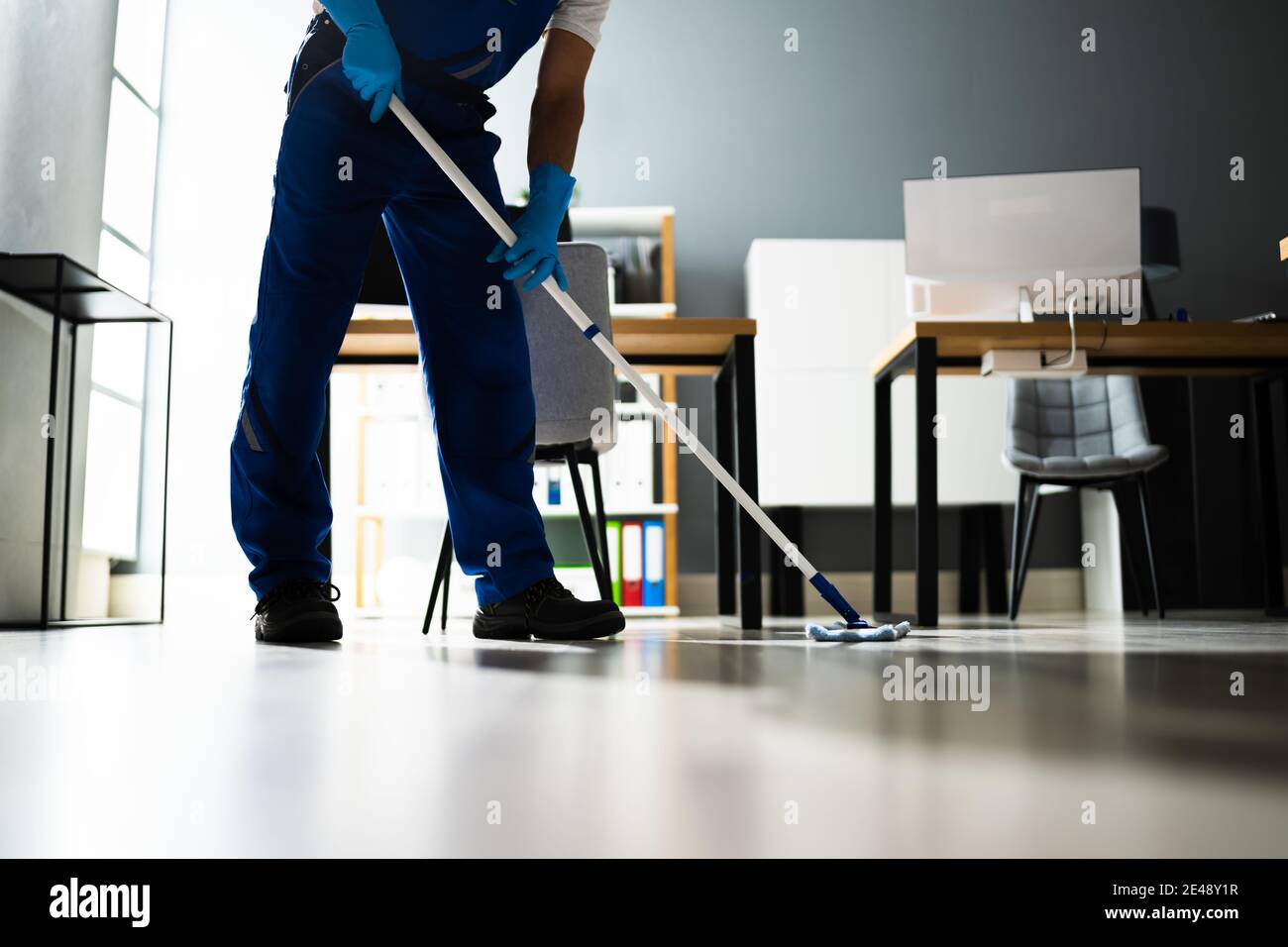Janitor mopping silhouette hi-res stock photography and images - Alamy