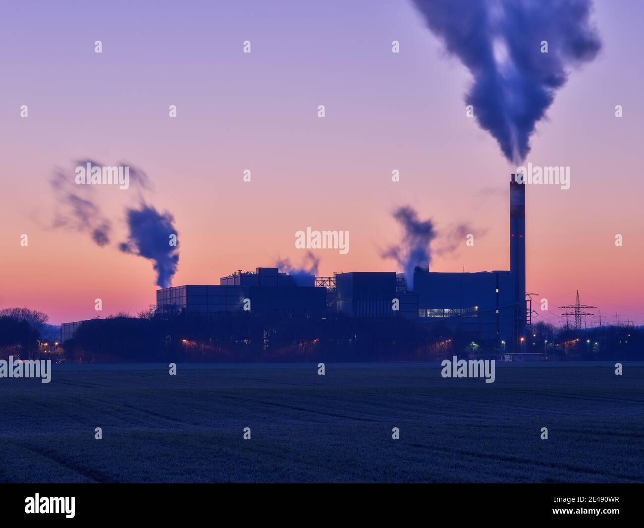 Incinerator, field, agriculture, chimney, chimney, smoking chimney, steam, dawn Stock Photo