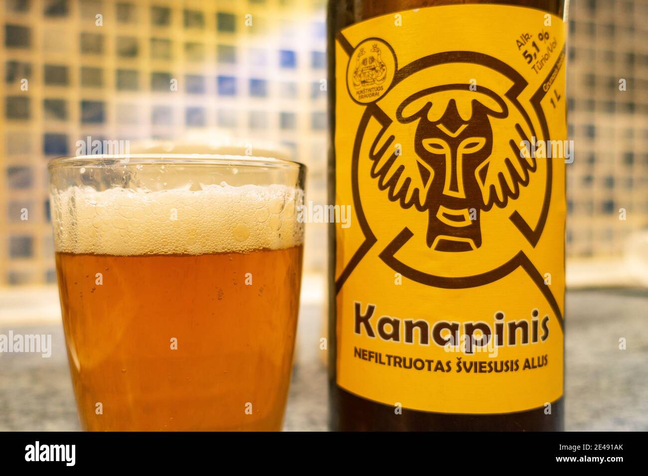 A bottle of Kanapinis, Eastern European beer, imported into the UK. Kanapinis is Lithuanian for 'of hemp', and the beers are both made with roasted he Stock Photo