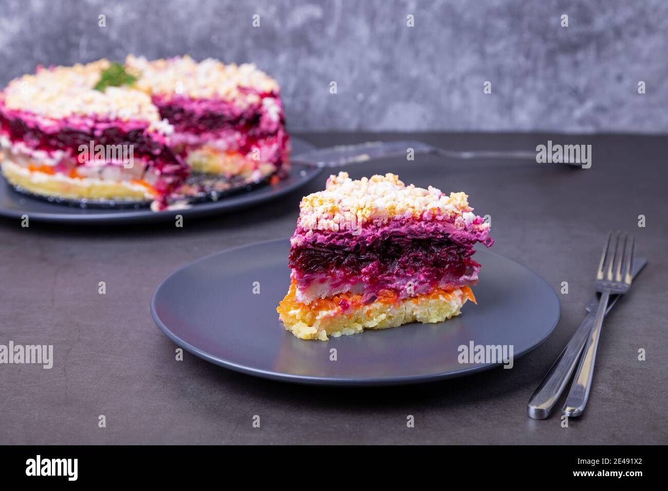 Herring salad under a fur coat. Traditional Russian multilayered salad