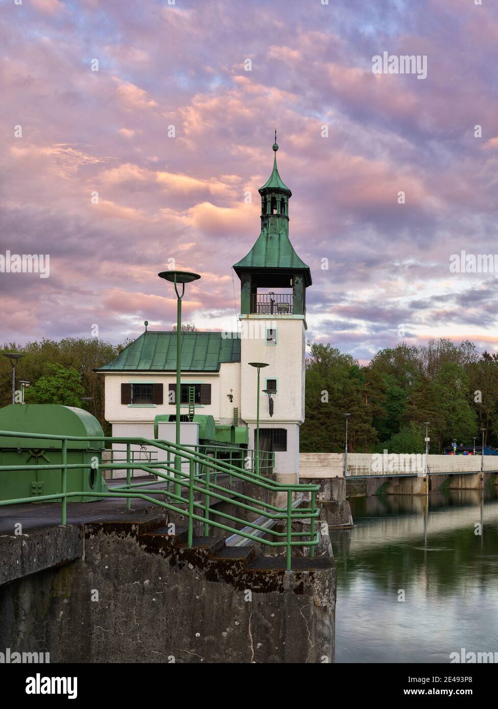 Gear house, bell tower, weir, weir, sluice, drain, canal, river, water, concrete, bank reinforcement, lanterns, trees, embankment, dusk, historical water management, place of interest, monument, listed Stock Photo