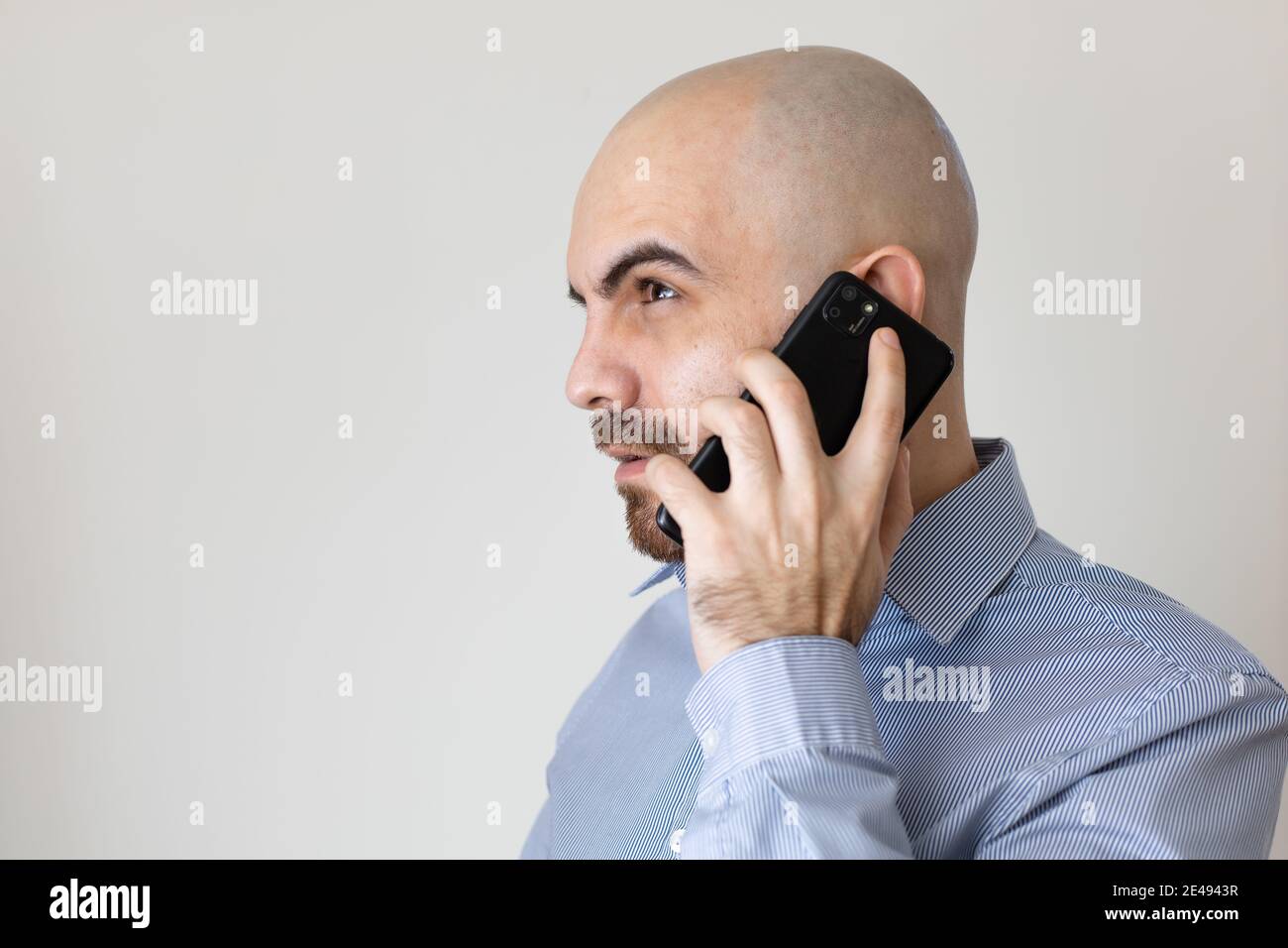 Talking business on the phone Stock Photo