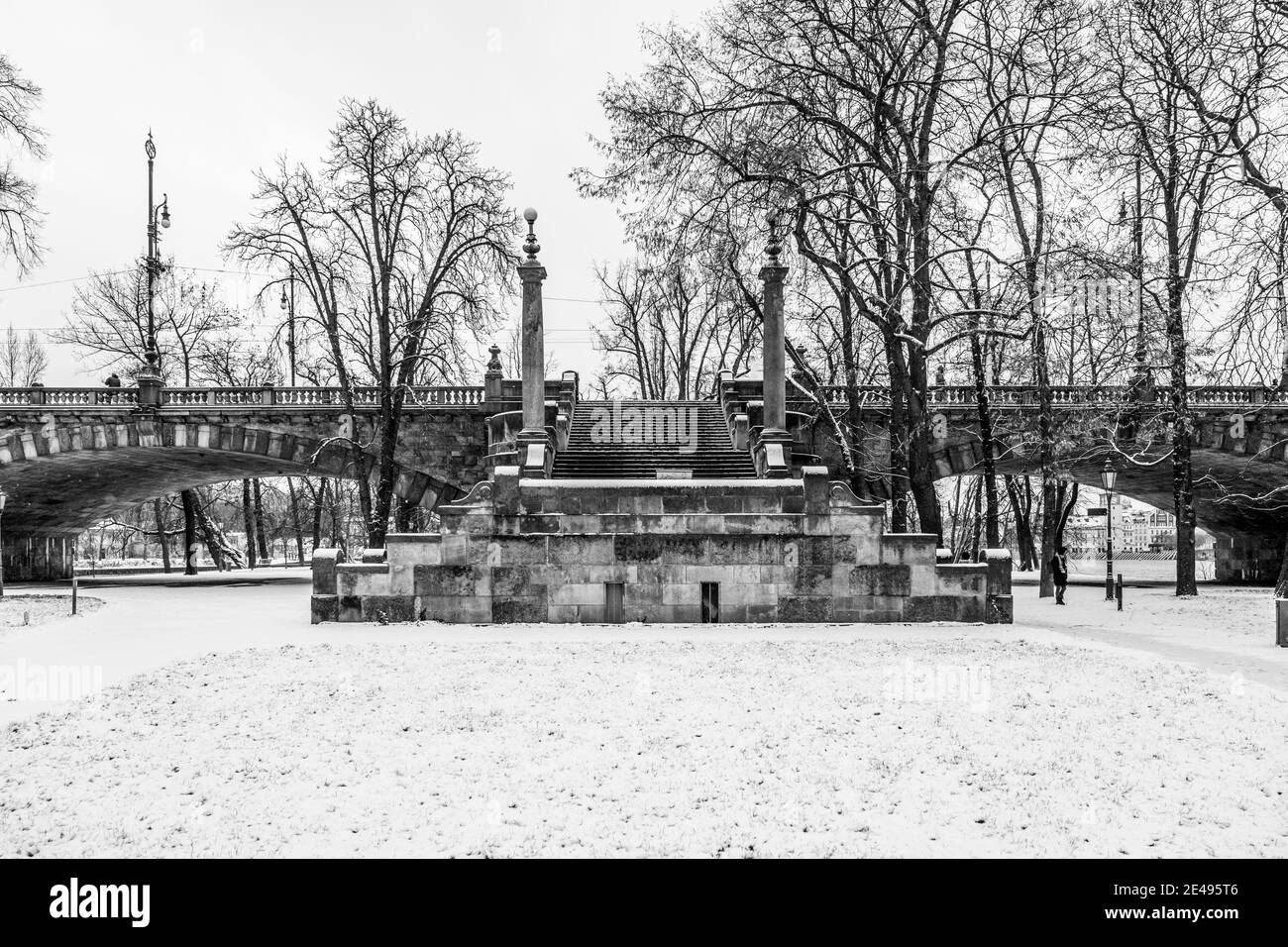 Historical staircase of Legion Bridge on Strelecky Island in Prague, Czech Republic. Winter photography. Black and white image. Stock Photo