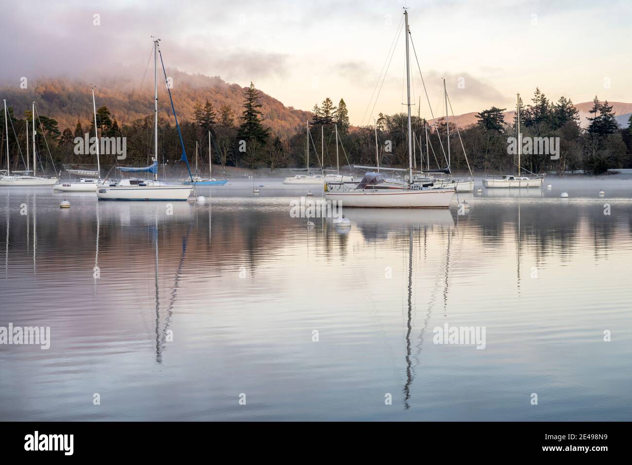 Yachts moored at Ferry nab on the banks of Lake Windermere Stock Photo