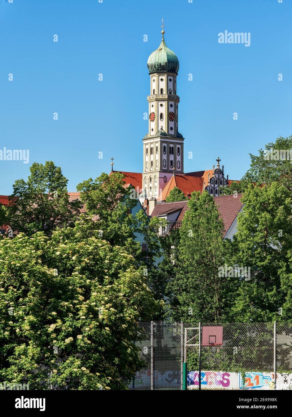Basilica, Catholic church, church, steeple, tower, trees, ditch, Lech Canal, canal, place of worship, place of interest, historical place of interest, historical old town, old town Stock Photo