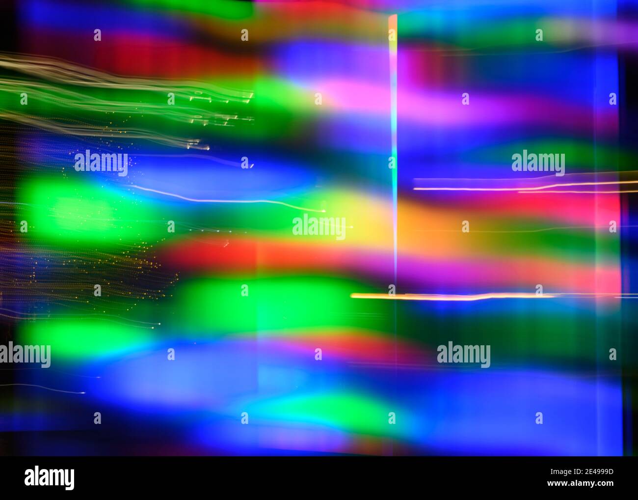 Vivid array of undefined shapes, lines, and squiggles created by LED lights photographed outdoors at night. Stock Photo
