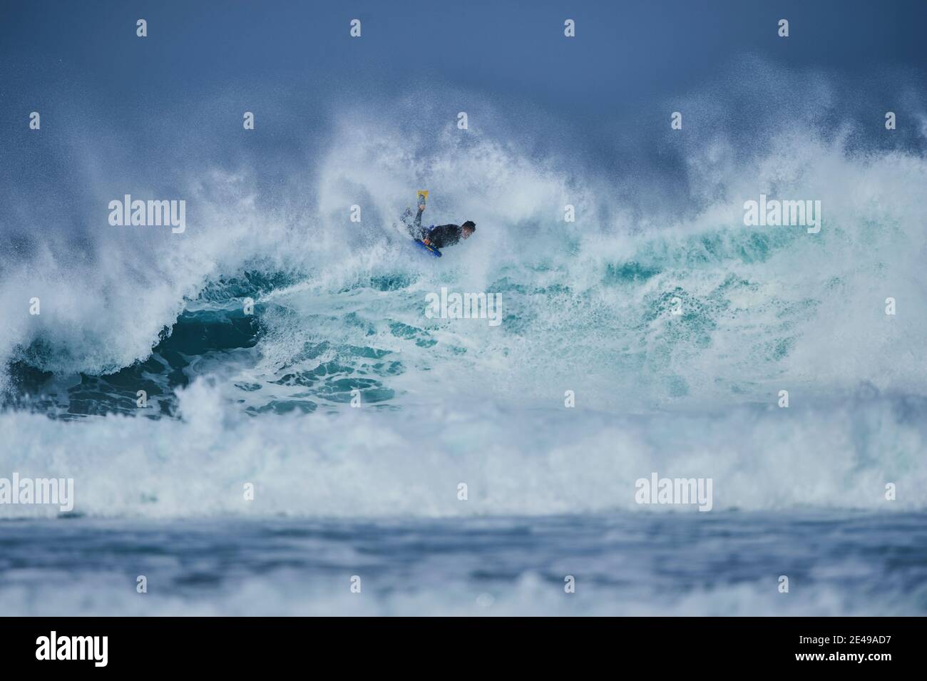 Sufer in a huge wave in the Atlantic Ocean, Fuerteventura, Canary Islands, Spain Stock Photo