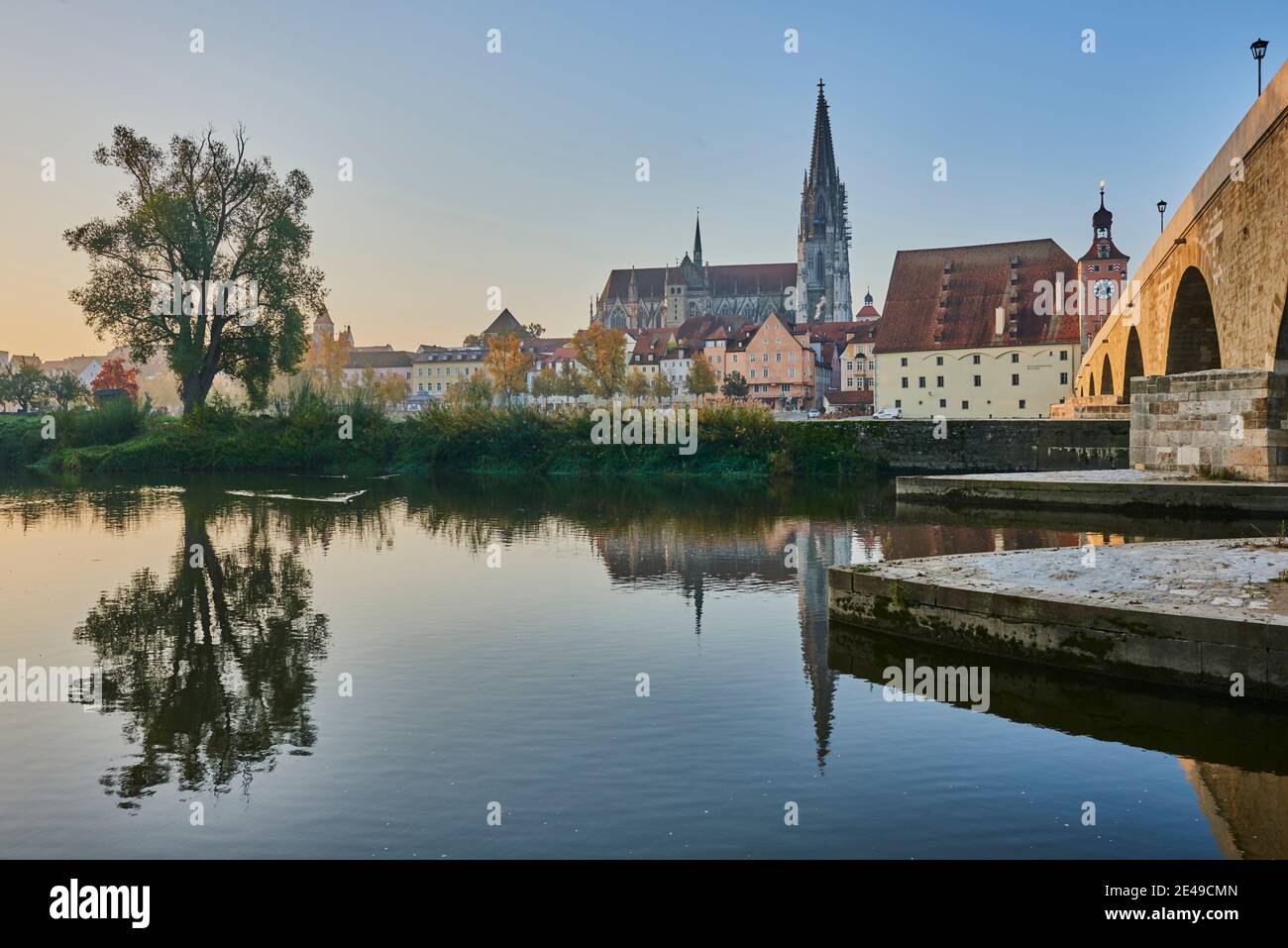 Stone bridge over Danube and old town with cathedral from Jahninsel, Regensburg, Upper Palatinate, Bavaria, Germany Stock Photo