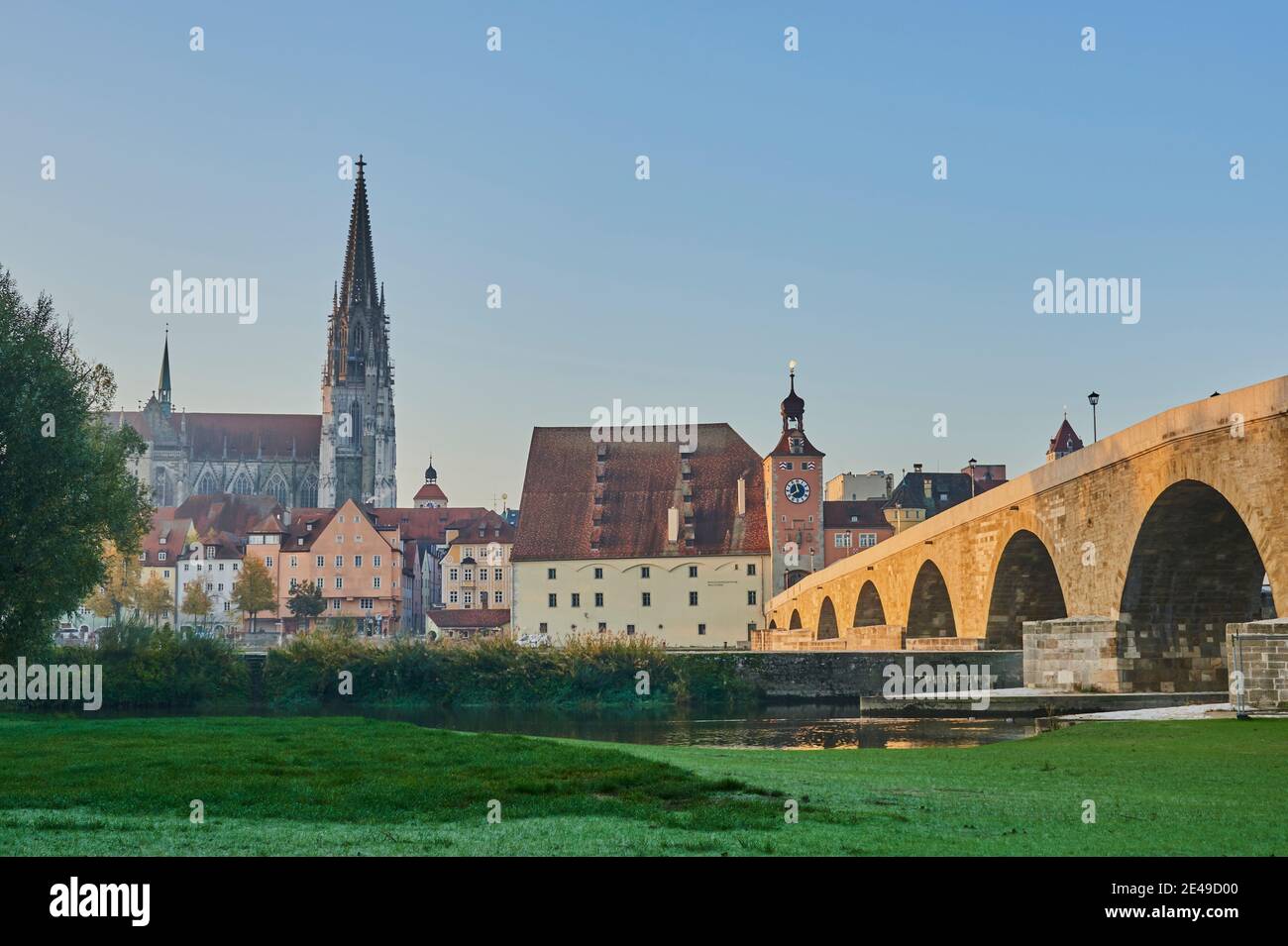 Stone bridge over Danube and old town with cathedral from Jahninsel, Regensburg, Upper Palatinate, Bavaria, Germany Stock Photo