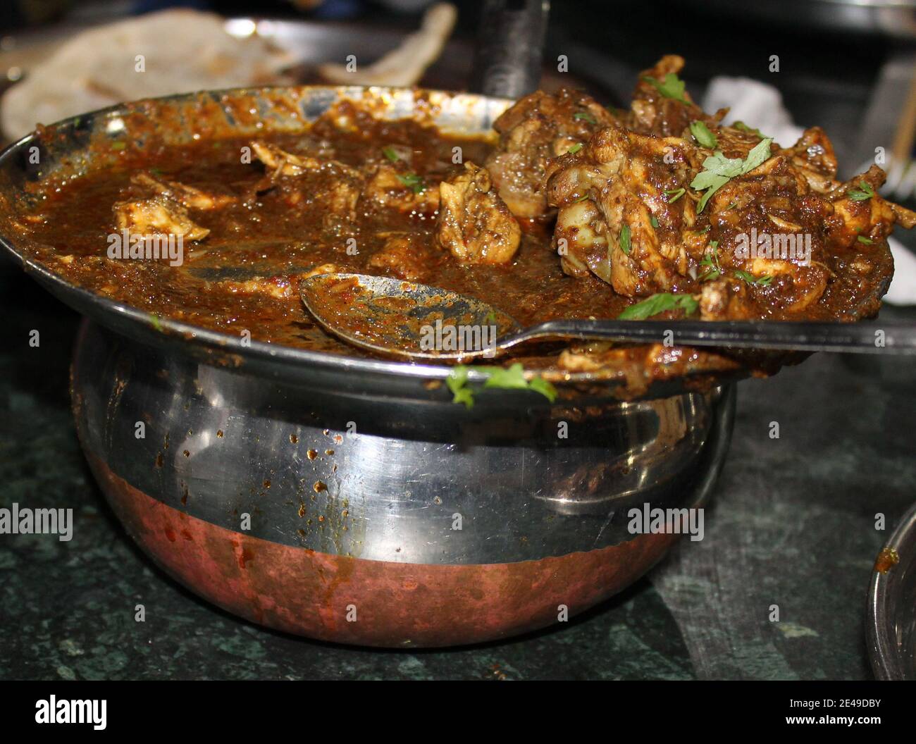 Chicken Handi maharashtrian from jagdamb hotel pune.kalya masalyache chicken. Stock Photo