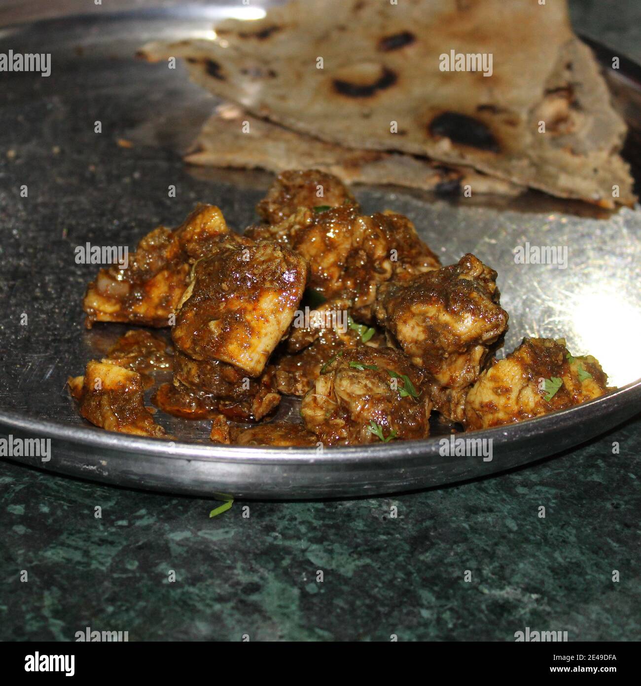 Chicken Handi maharashtrian from jagdamb hotel pune.kalya masalyache chicken. Stock Photo