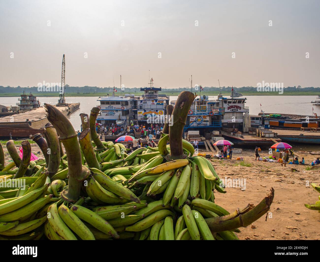 Iquitos, Peru - May 13, 2016: A lot of bananas in a port of Iquitos on Amazon River. Amazonia Latin America. Stock Photo