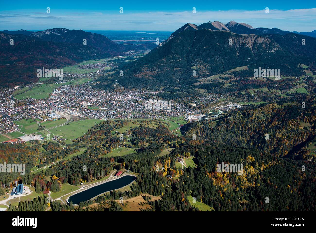 Local mountain, snowmaking lake, Garmisch Classic area, Loisachtal, Wank, Partenkirchen, autumn, Garmisch-Partenkirchen, aerial view, Werdenfelser Land, Oberland, Bavaria, Germany Stock Photo