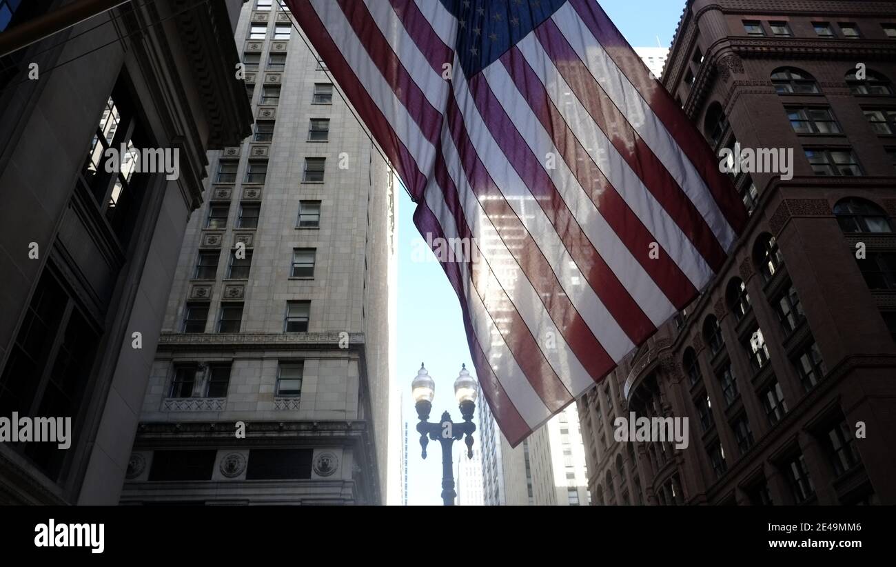 La Salle Street, Chicago. US flag with historical buildings Stock Photo
