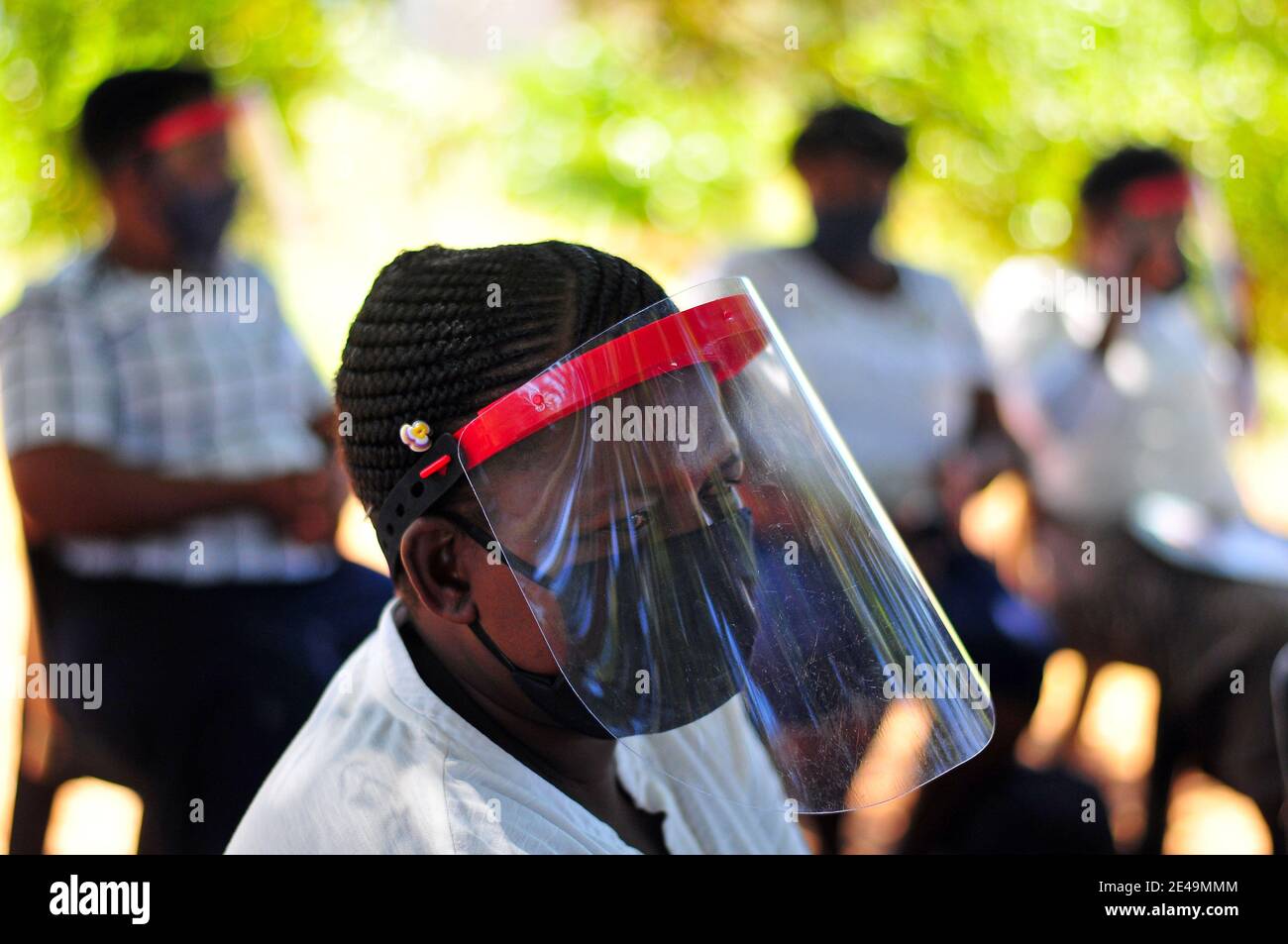 Community health care workers gather under a tree in Sekhukhune, a