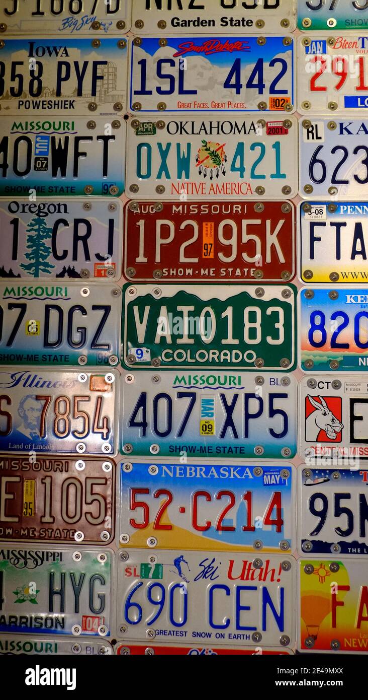 License plates from various US states decorate the walls of a Missouri rest area Stock Photo