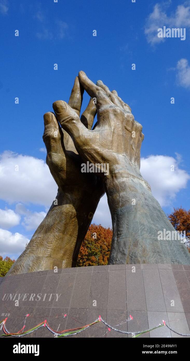 Oklahoma, Tulsa. Praying Hands a.k.a. Healing Hands designed by Leonard McMurry, at the entrance to Oral Roberts University, is the world's largest bronze sculpture Stock Photo
