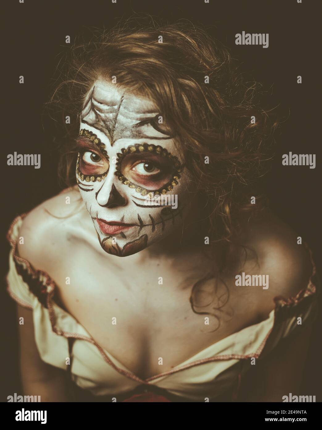 Portrait of young woman make up and masked like dia des los muertos style, mexican tradition, day of the dead, bodypainting, Stock Photo