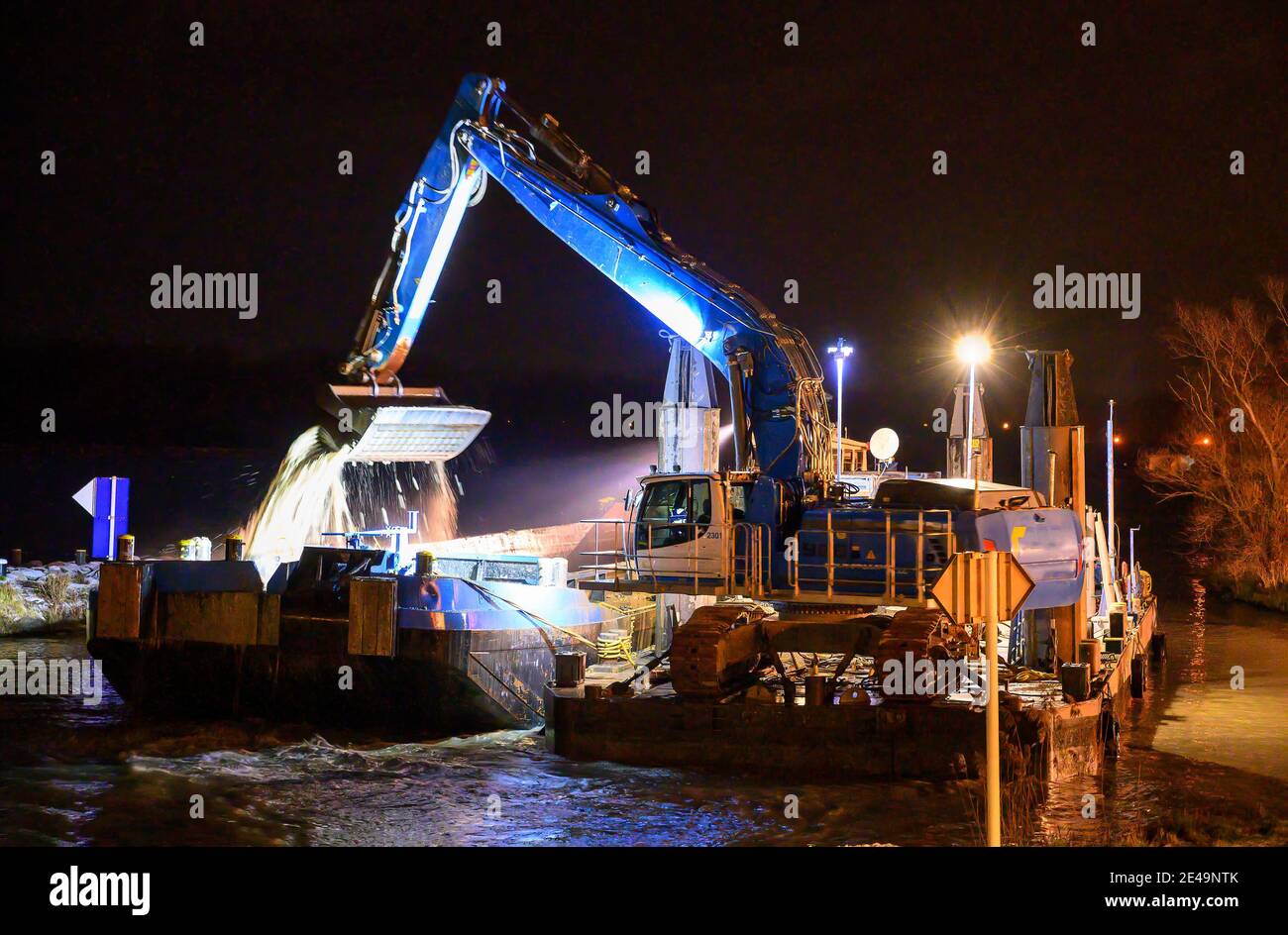 dredger at the guest harbour of Tulln on the river Danube in the night, Austria Stock Photo