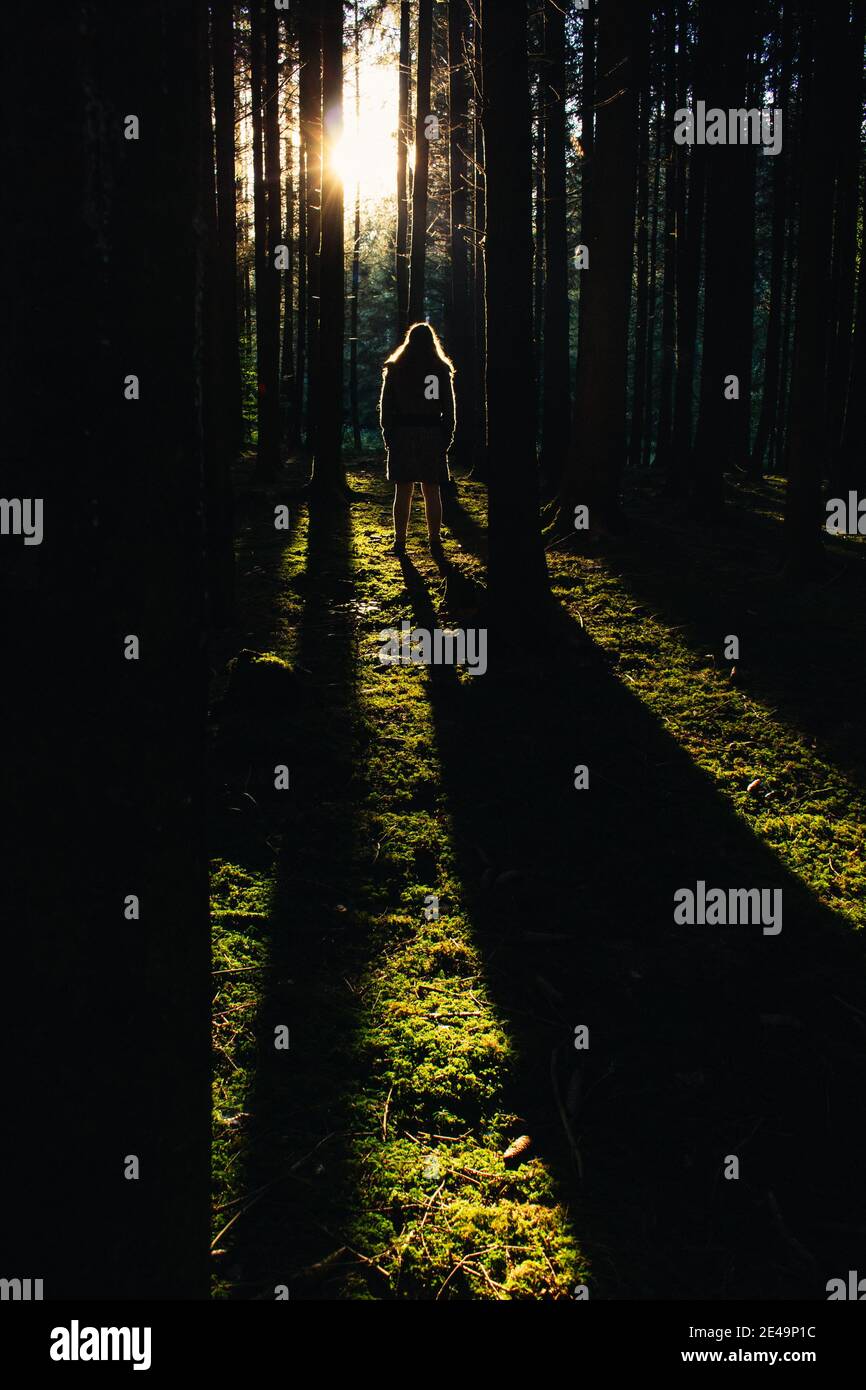 Back view lonely girl in hi-res stock photography and images - Alamy