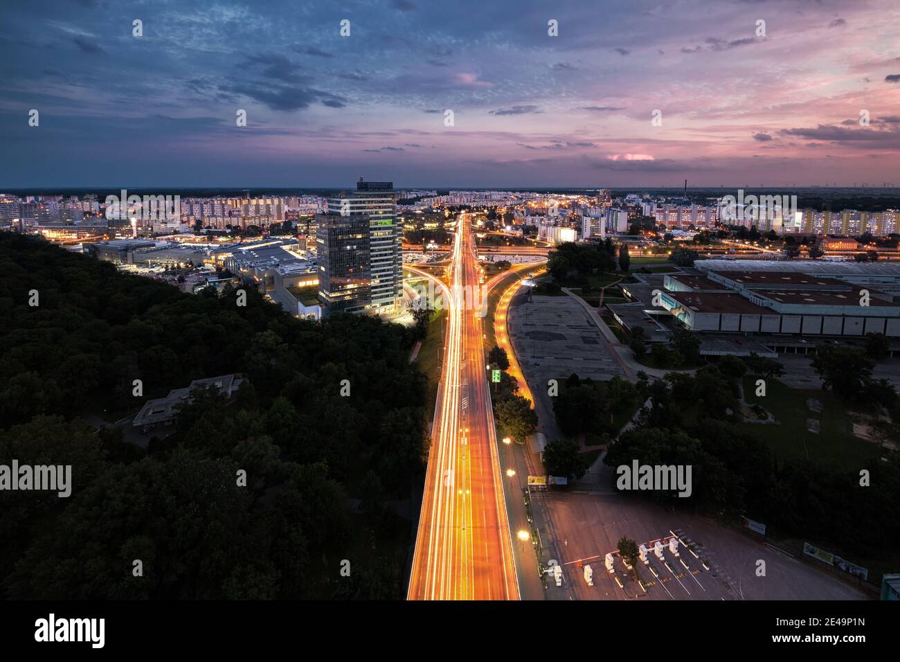 Bratislava Sky view from Bridge UFO Restaurant with Car Light trails at Sunset Stock Photo