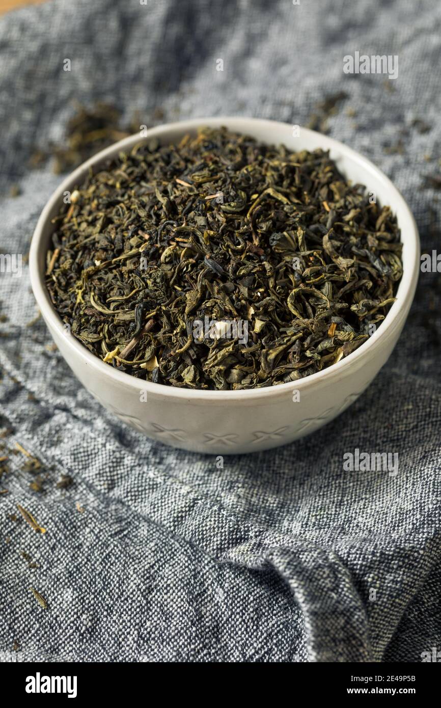 Dry Green Organic Tea Leaves in a Bowl Stock Photo Alamy