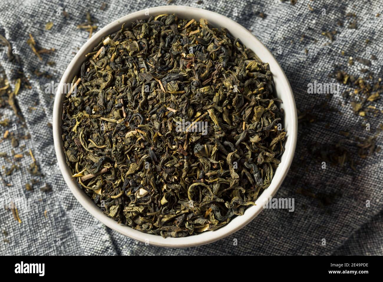 Dry Green Organic Tea Leaves in a Bowl Stock Photo Alamy