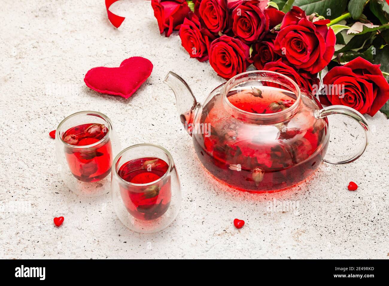 Romantic morning tea and soft felt heart. Love concept for ...